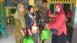 Kegiatan MBG Bagi Ibu Hamil dan Balita di Balai Desa Tambung.