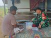 Babinsa Koramil Pegantenan Komsos Bersama Warga Bahas Hasil Panen Padi Tahun ini.